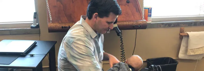 Chiropractic Ellensburg WA Gary Favero with baby Gary Favero with baby in lap