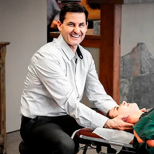Chiropractic Ellensburg WA Gary Favero doing chiropractic care to a patient Gary Favero doing chiropractic care to a patient